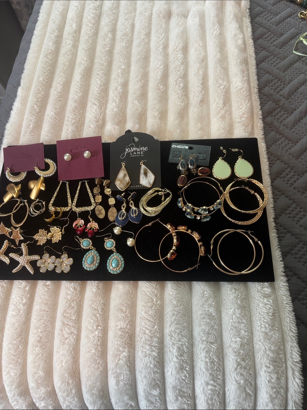 Lot of goldtone earrings.. pearls, stones and lots of bling!